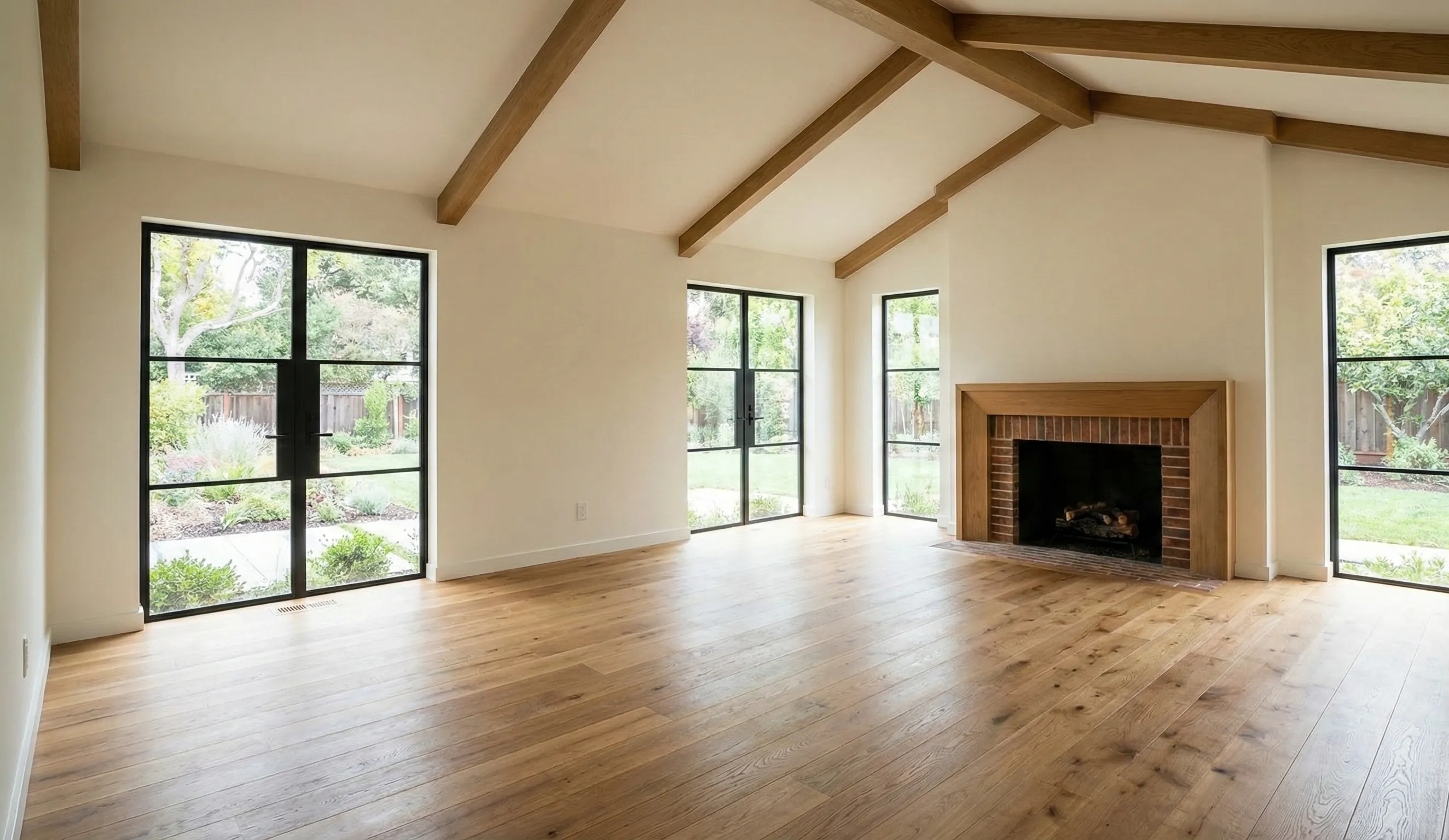 Empty living room with exposed beams and fireplace before AI-generated furnishing